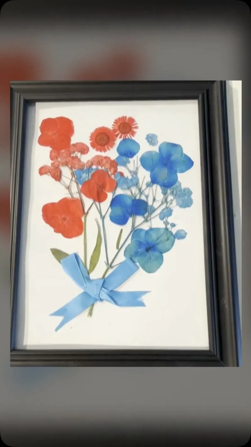 Pressed flowers art, real blooms, preserved for ever – still from a video of handmade work by Artful by SN, posted on Instagram October 11, 2026